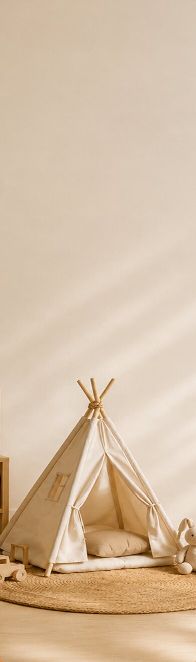 A cozy play teepee with a plush rabbit, set in a warm, sunlit room
